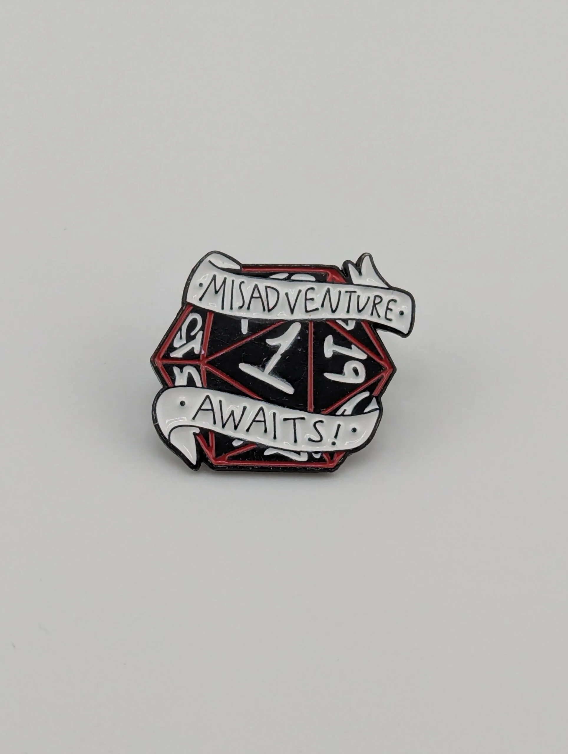 Misadventure Awaits! D20 Pin Badge